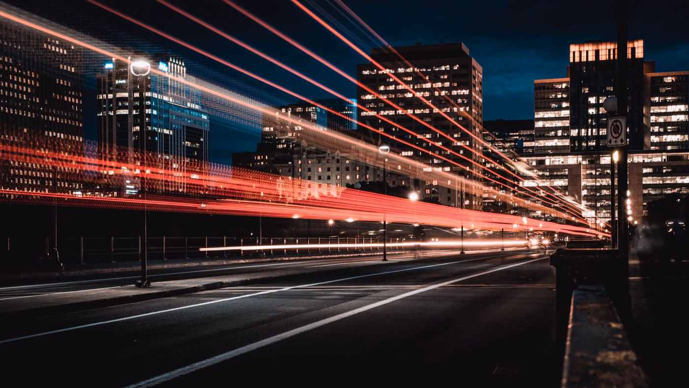 Bands of streaming light over a freeway